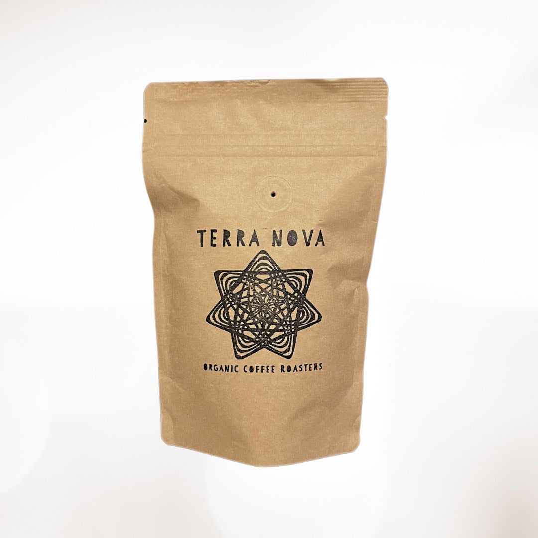 Terra Nova's sample packs come in sealed kraft bags with a one-way valve and resealable closure. The one-way valve allows gas to escape without letting oxygen in, keeping the coffee super-fresh when sealed properly. Each bag is hand-stamped and labeled.