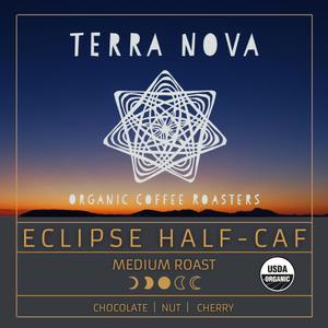 Terra Nova's organic Eclipse Half-Caf coffee. A balanced, bright, and satisfying signature blend with half the kick. Half decaffeinated using water processes. This medium roast has tasting notes of chocolate, nut, and cherry.