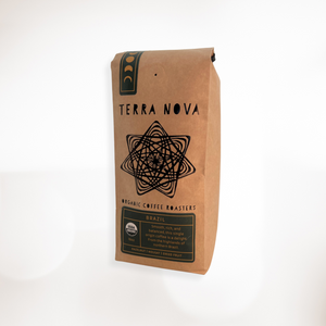 Terra Nova Organic Coffee is  proud to offer Rainforest Alliance Certified organic coffee direct from Brazil. We carefully roast the arabica beans to the perfect medium-dark, bringing forward balanced notes of hazelnut, nougat, and dried fruit. The family owned and operated farm we source our beans from is focused on biodiversity and sustainable land management, making this coffee even easier to enjoy!