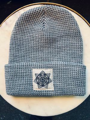 Comfy and stylish, Terra Nova Grey waffle-knit beanie with our star logo.